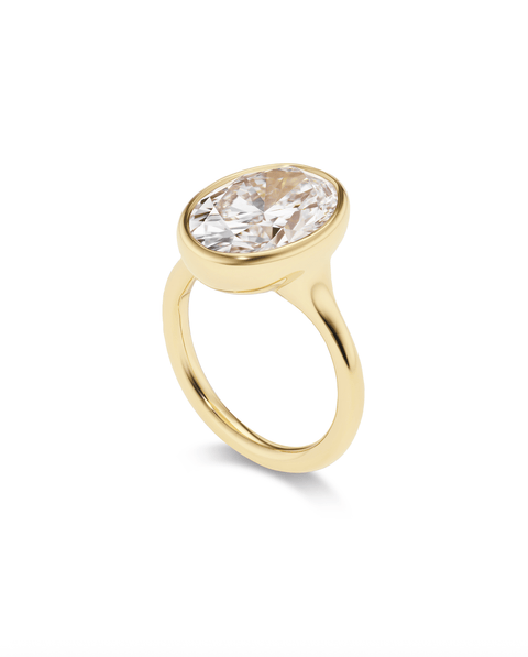 gold bezel engagement ring side profile