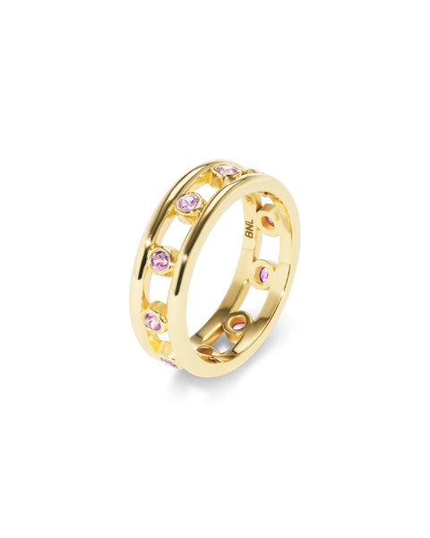 gold pink sapphire stacking ring with bezel set stones