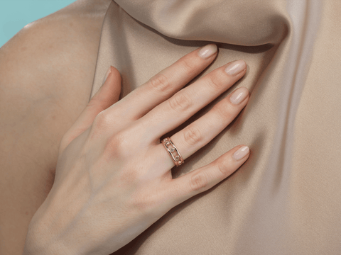 dottie pink sapphire band worn on hand stacking ring