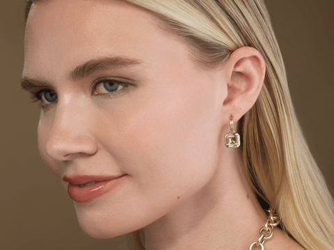 statement tourmaline drop earrings worn on model