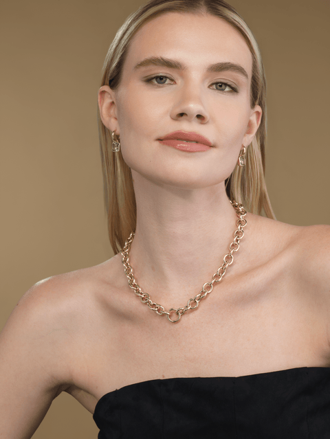 statement tourmaline drop earrings worn on model